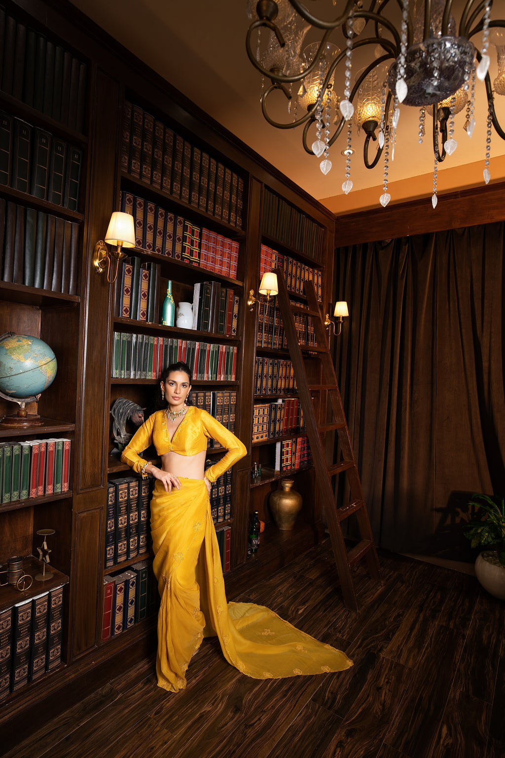 Golden yellow embriodered sari set .