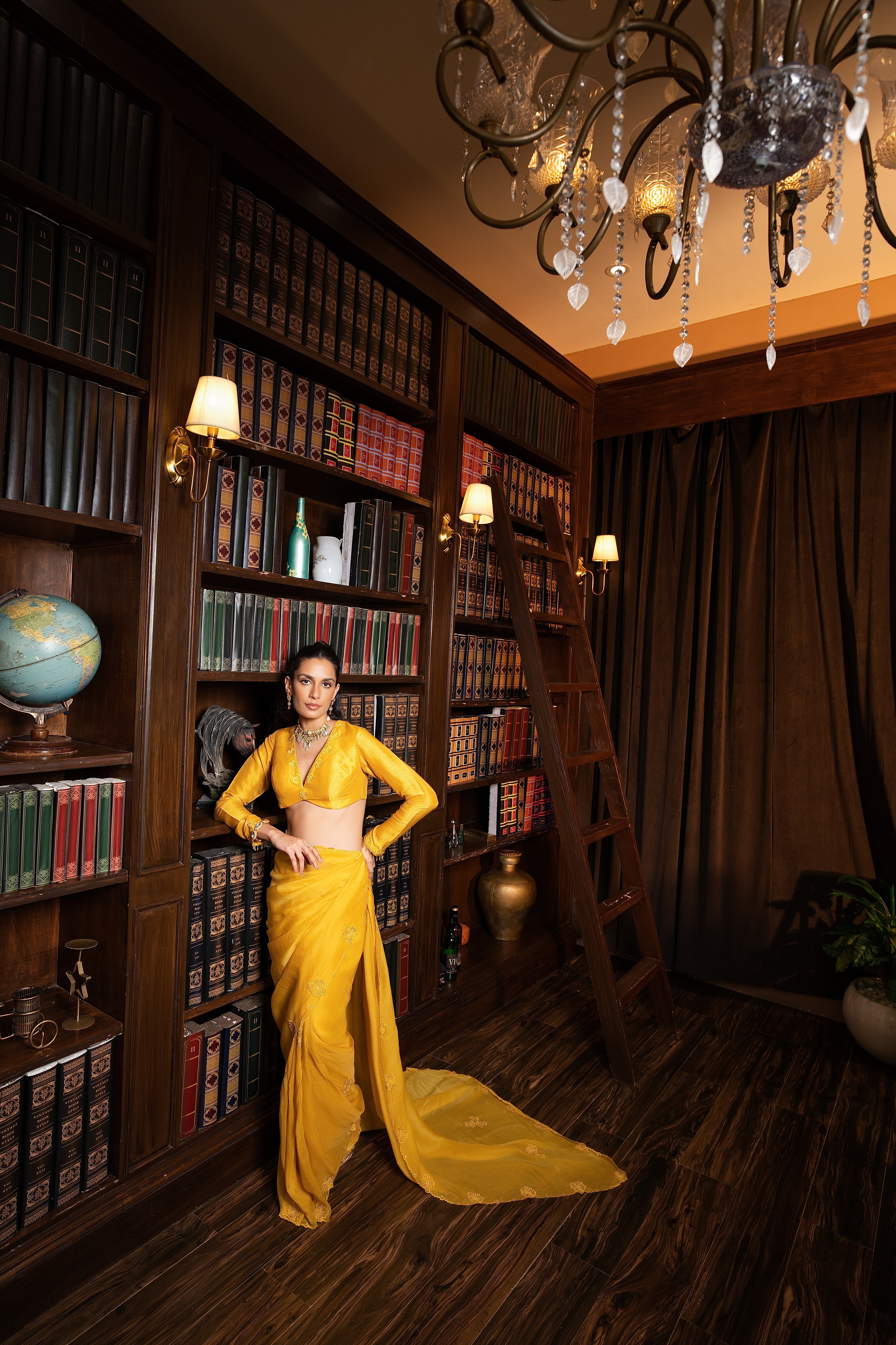 Golden yellow embriodered sari set .