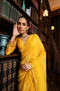 Golden yellow embriodered sari set .