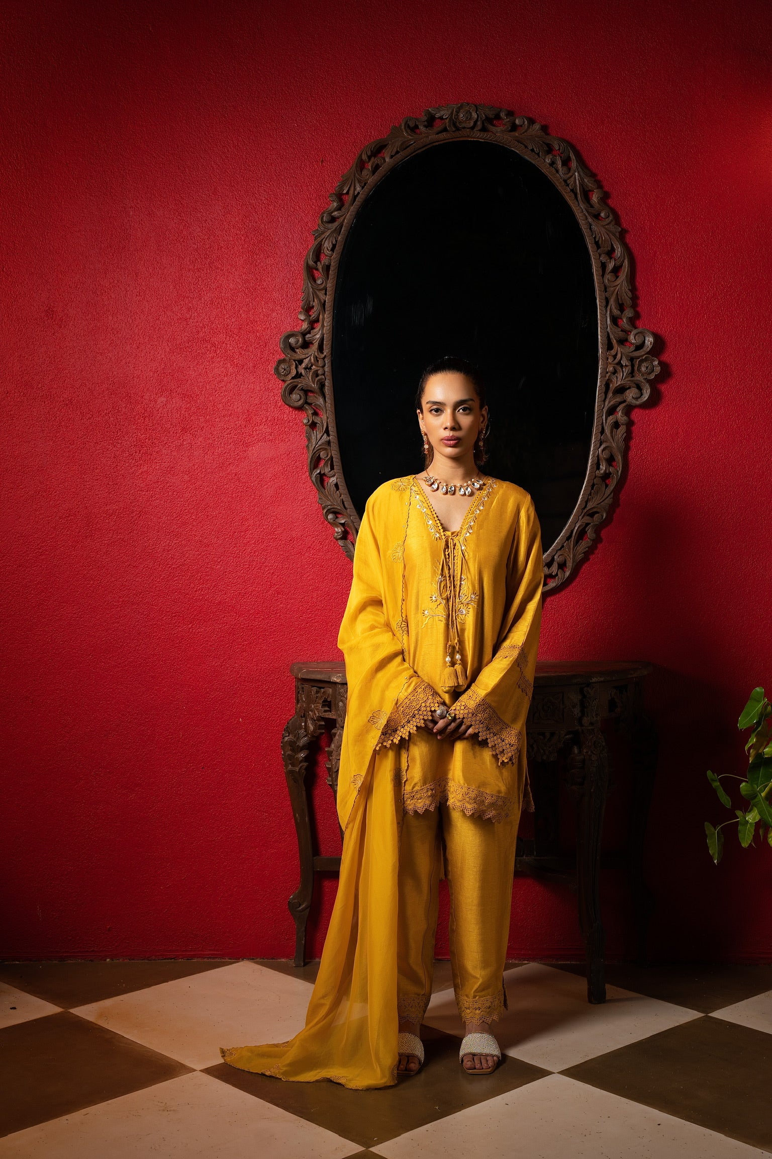 Sunshine yellow embriodered short kurta set.