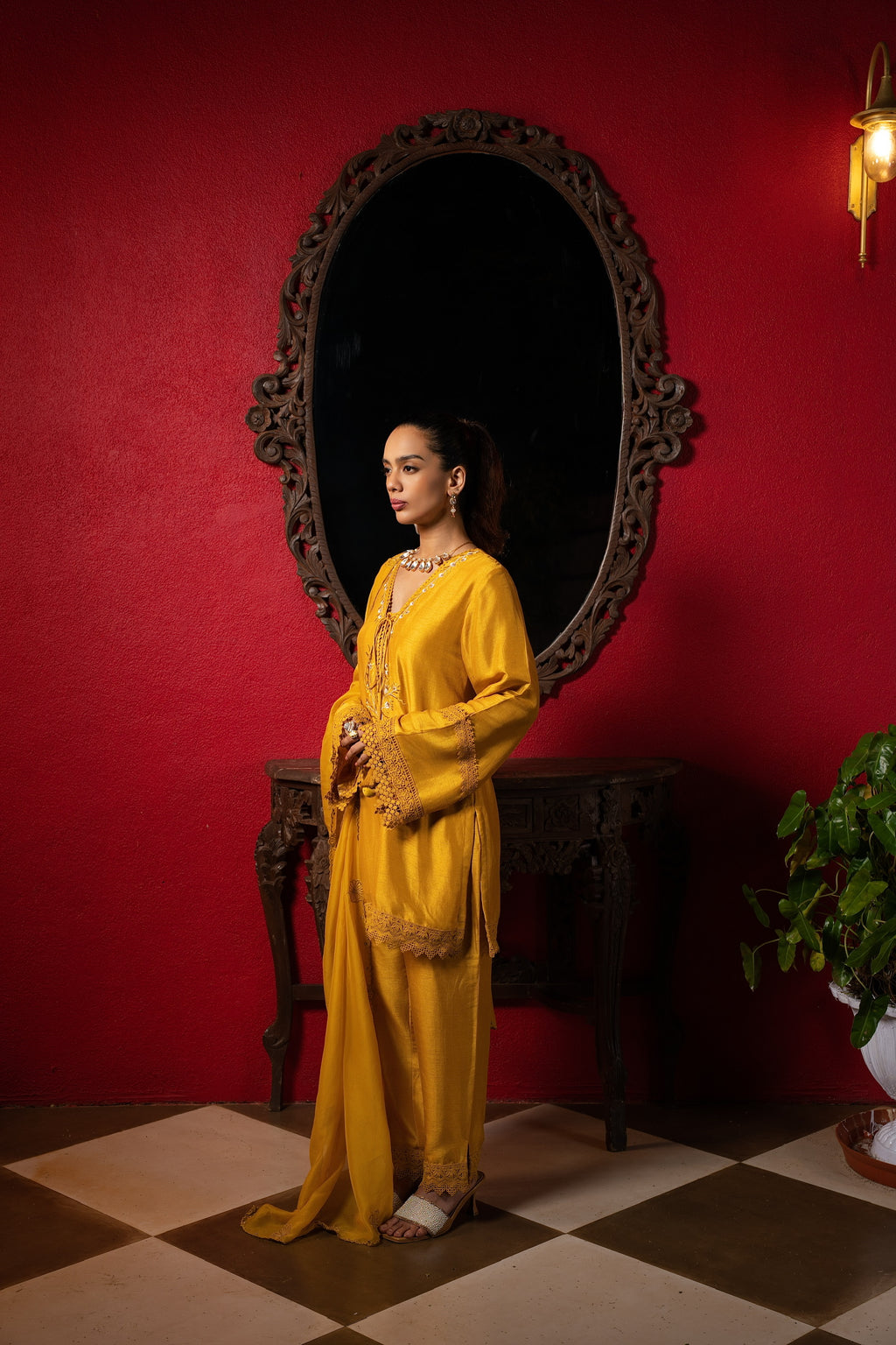 Sunshine yellow embriodered short kurta set.