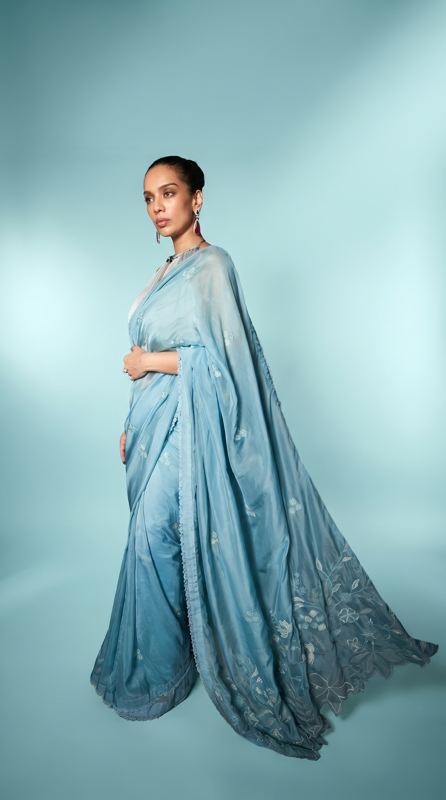 Turquoise & sage blue embriodered organza sari set.