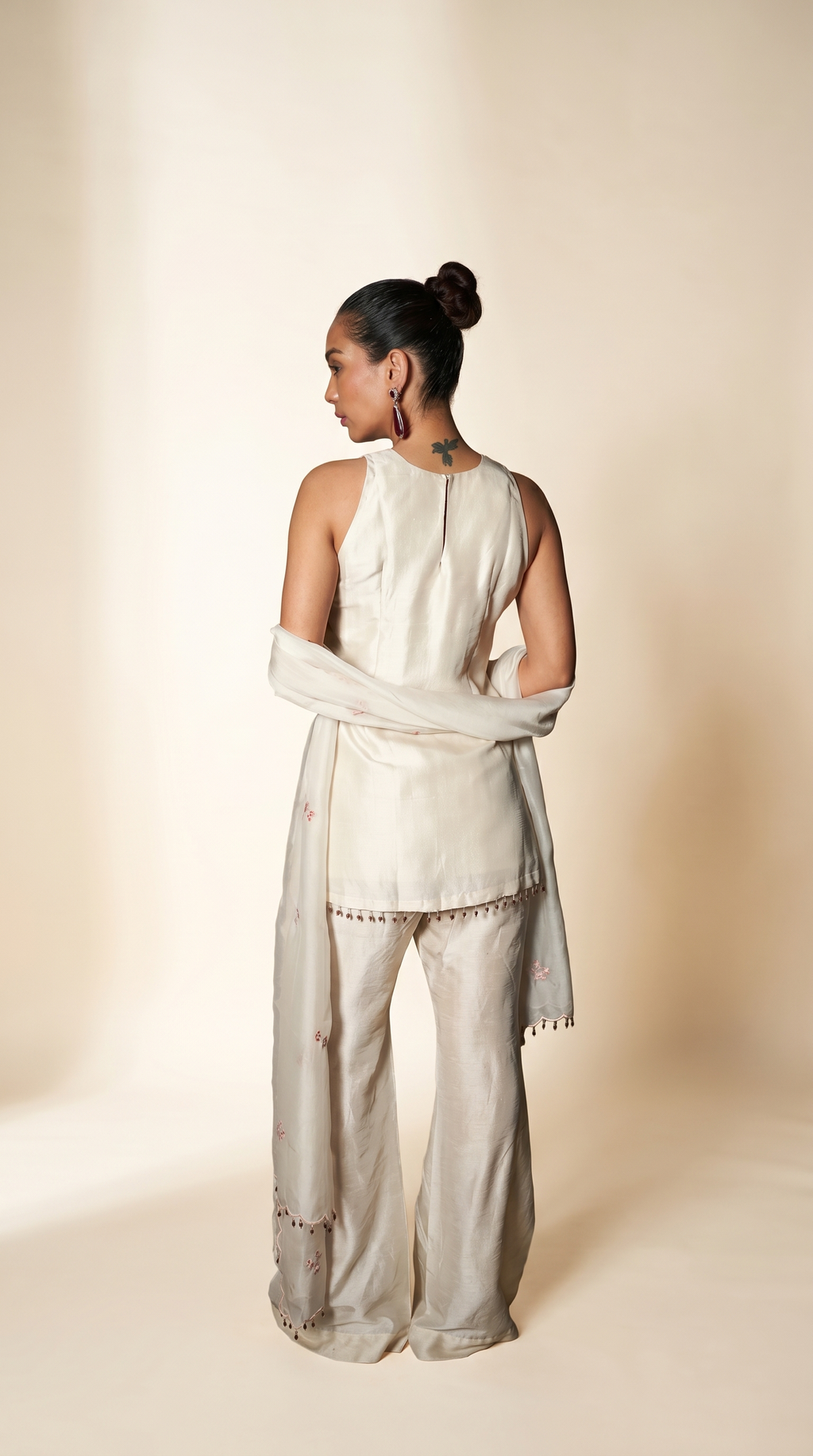 Ivory sleeveless short kurta set