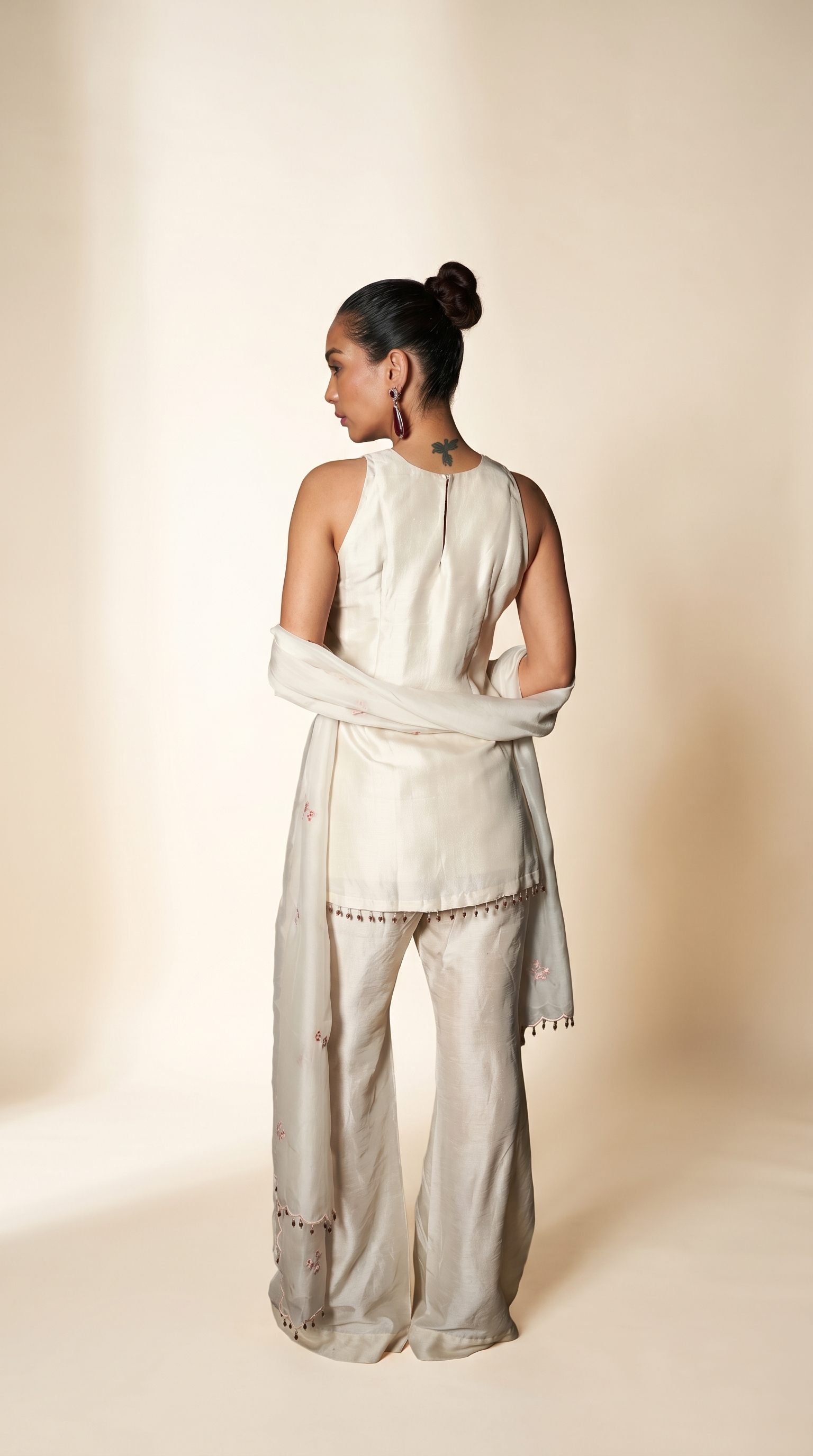 Ivory sleeveless short kurta set