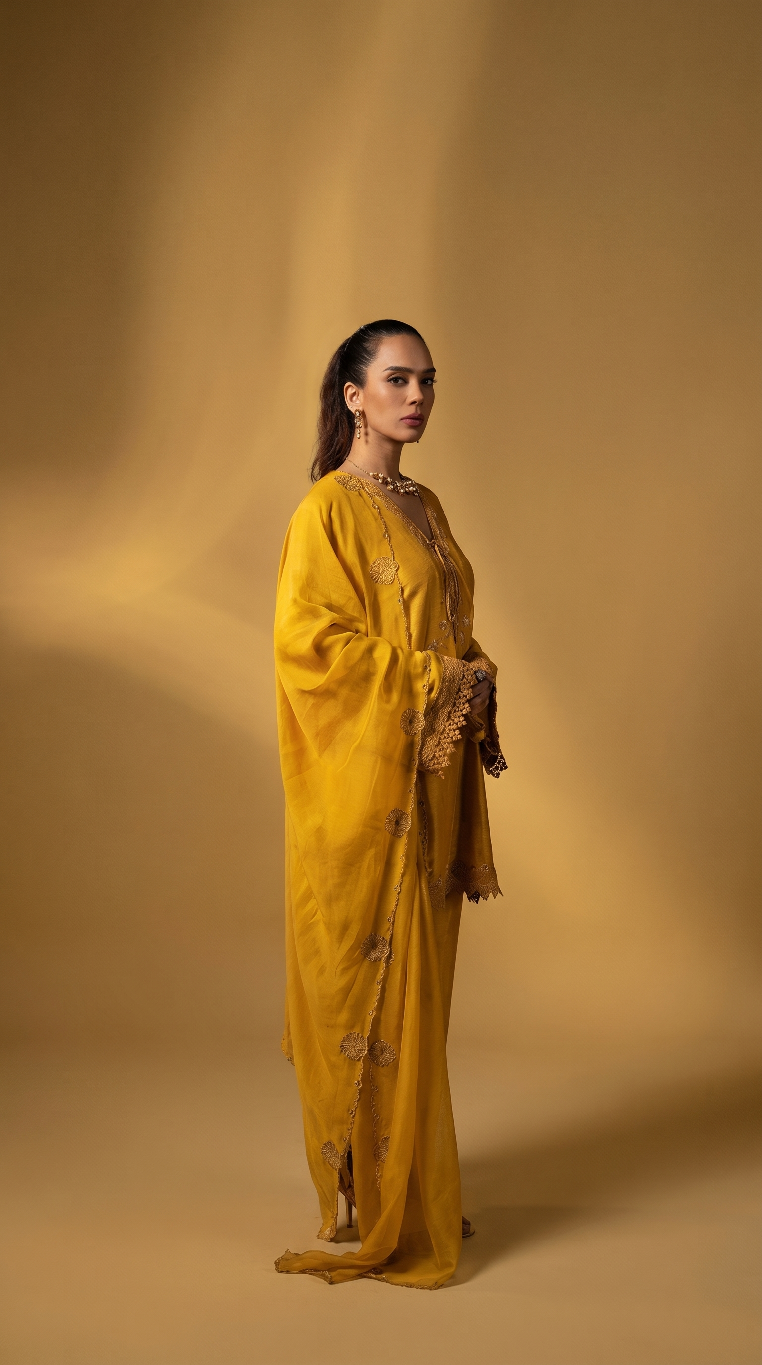 Sunshine yellow embriodered short kurta set.