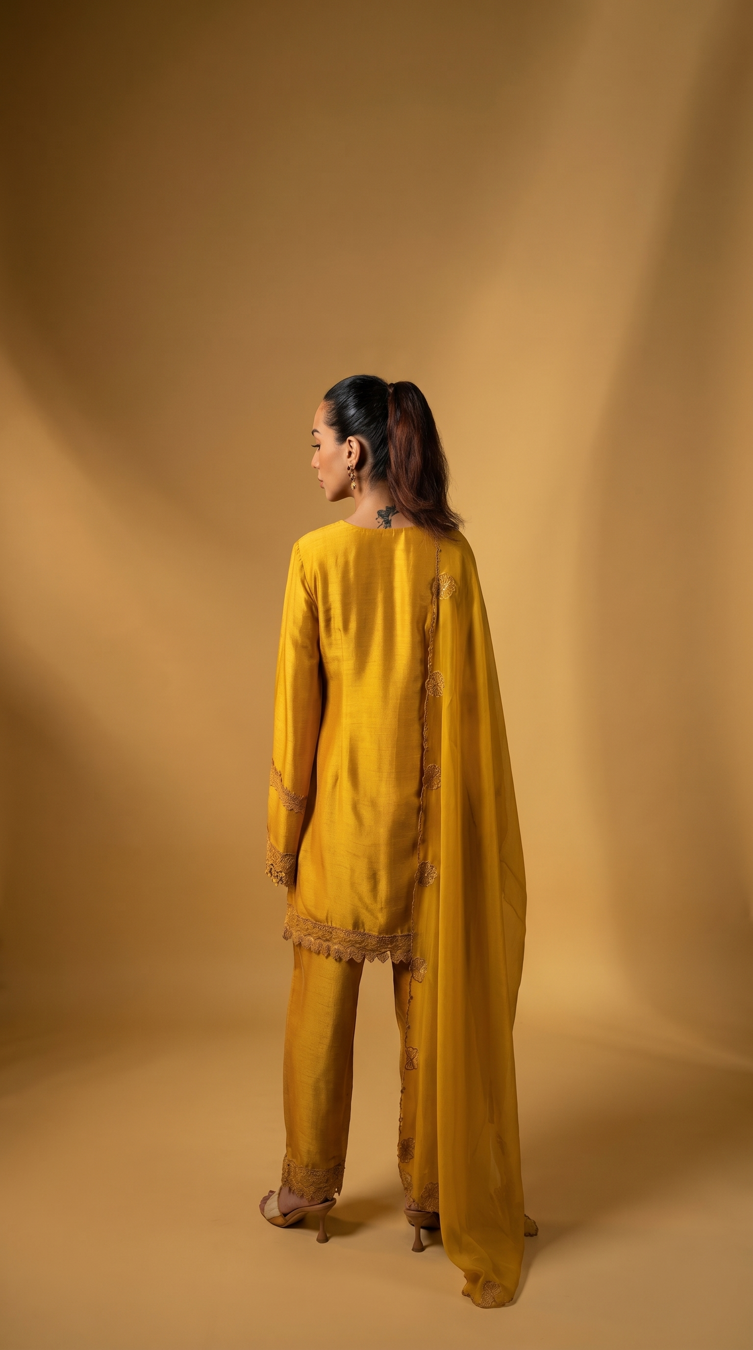 Sunshine yellow embriodered short kurta set.