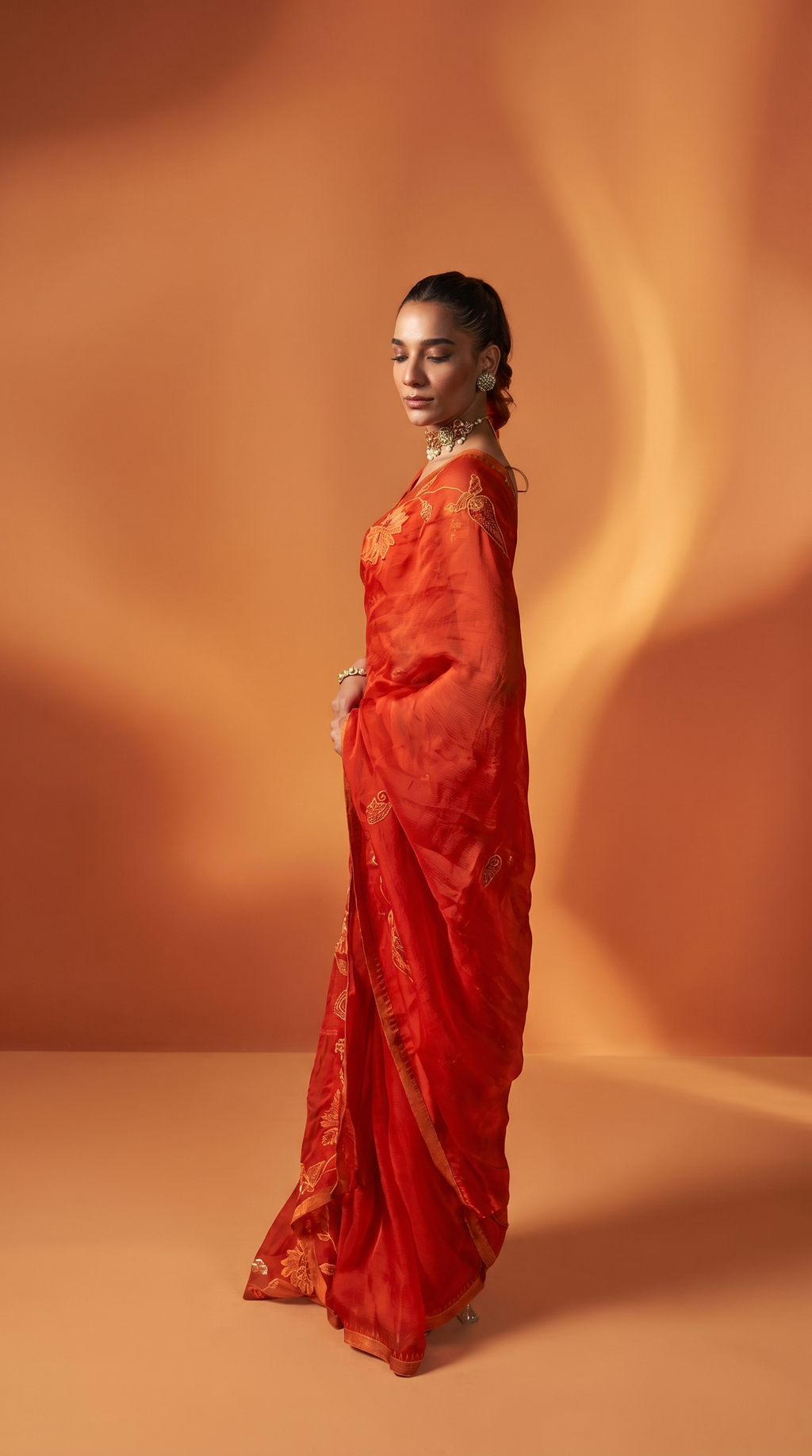 Burnt Orange embriodered organza sari set.