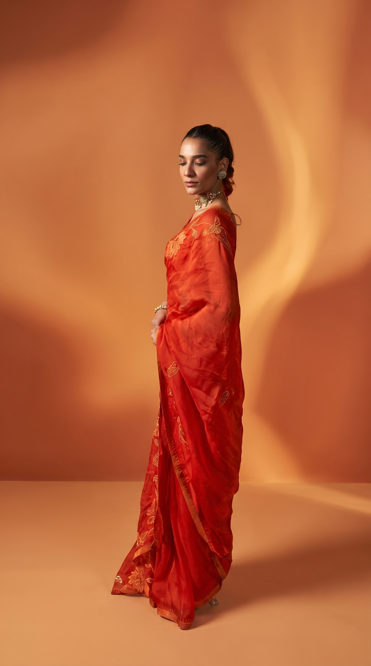 Burnt Orange embriodered organza sari set.