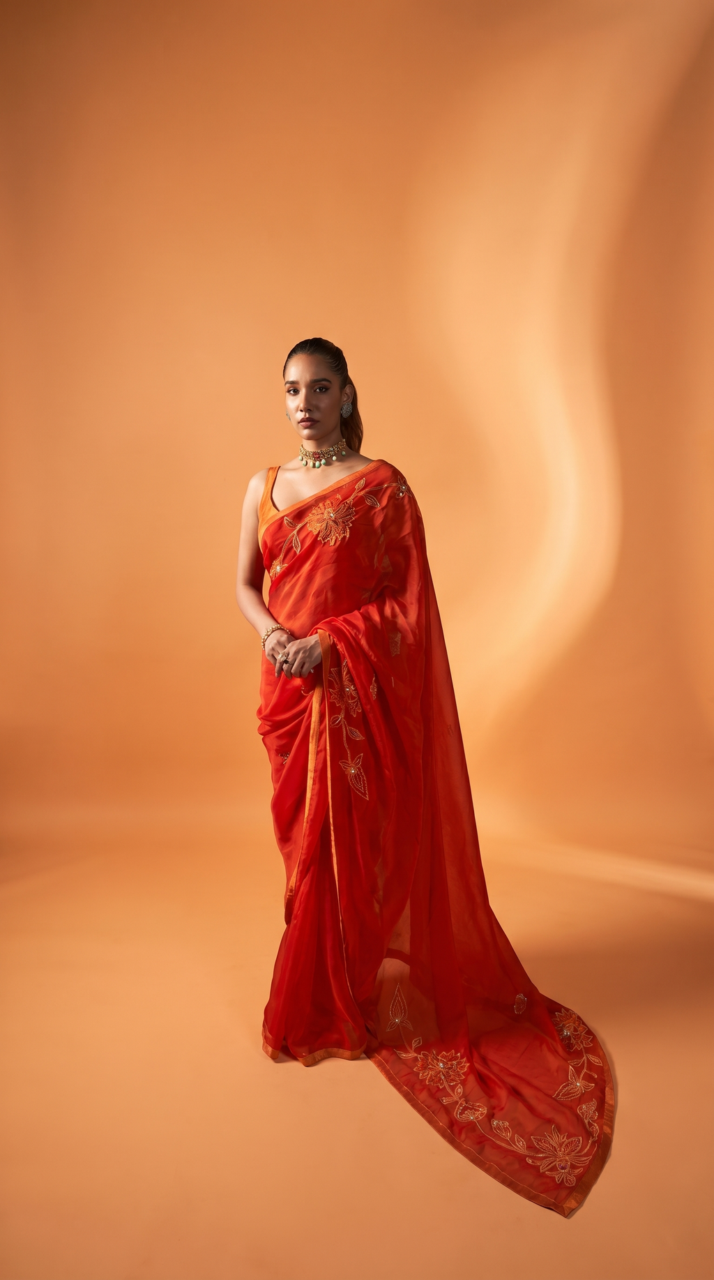 Burnt Orange embriodered organza sari set.