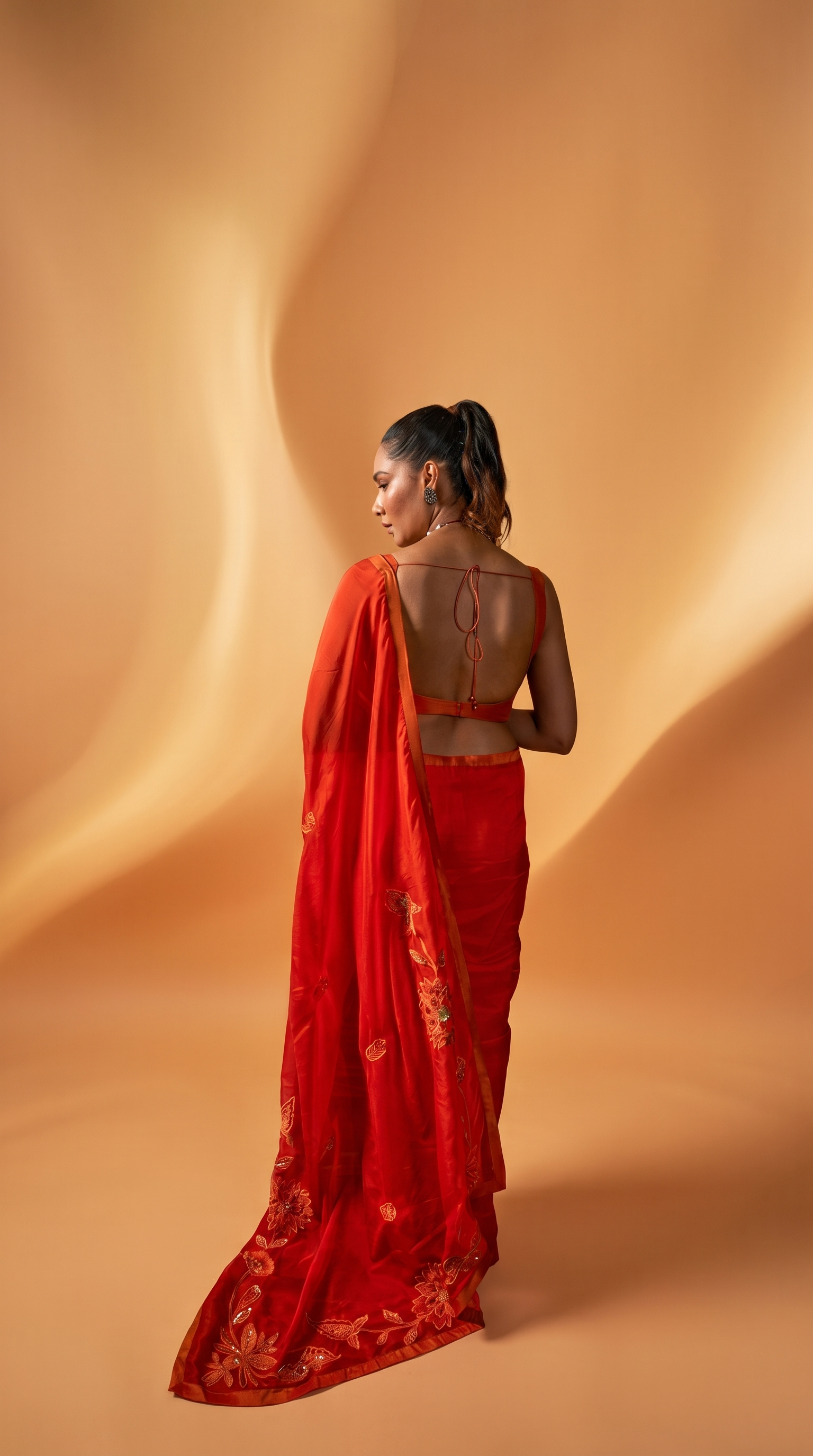 Burnt Orange embriodered organza sari set.