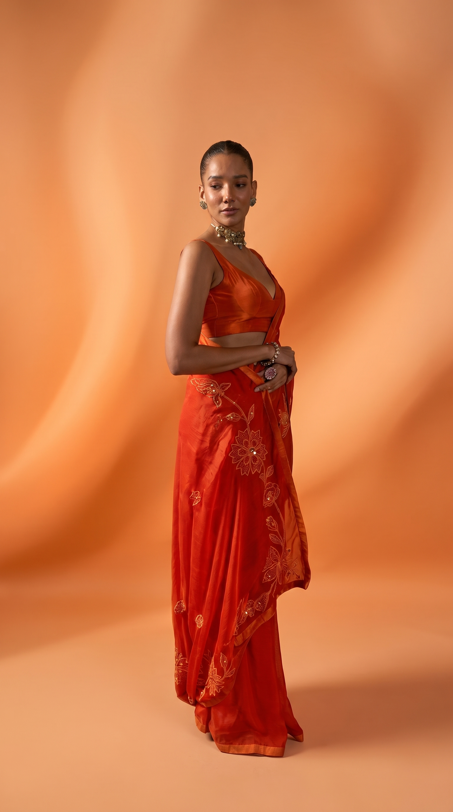 Burnt Orange embriodered organza sari set.