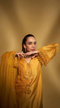 Sunshine yellow embriodered short kurta set.